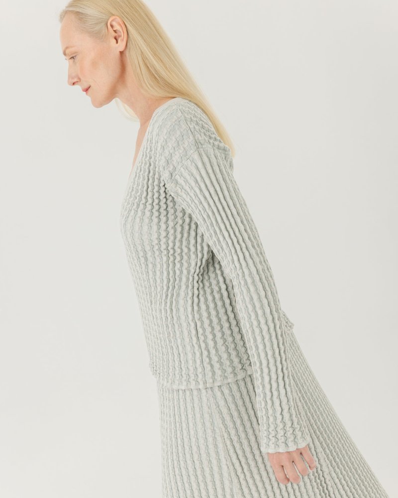 Žemės: Sky Blue V - neck Sweater